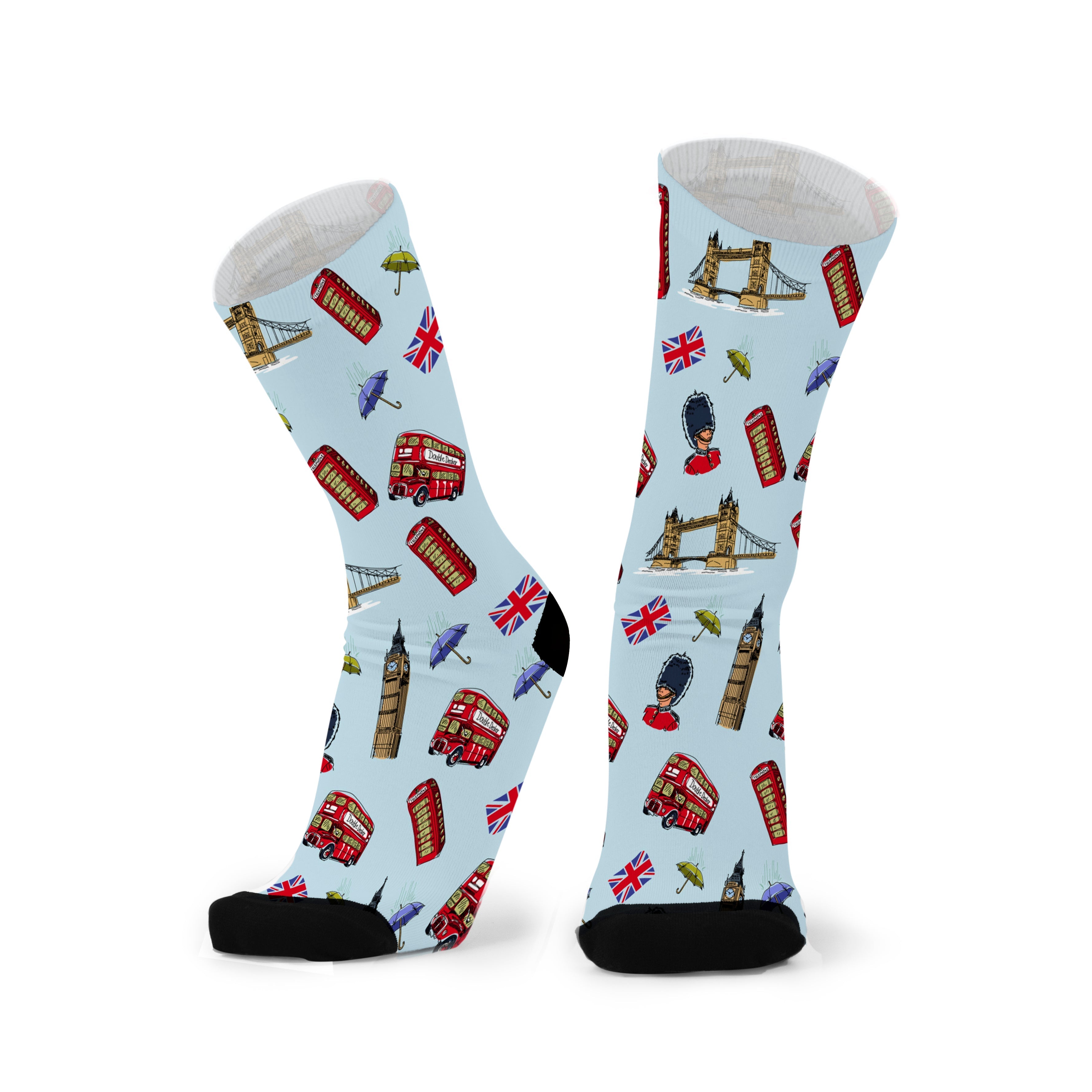 Pair of pale blue socks with black toes, printed with Big Ben, Tower Bridge, red double-decker buses and red phone boxes.