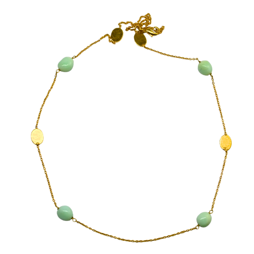 Fine gold chain necklace with mint-green chalcedony stones and brushed gold ovals, laid in a circle