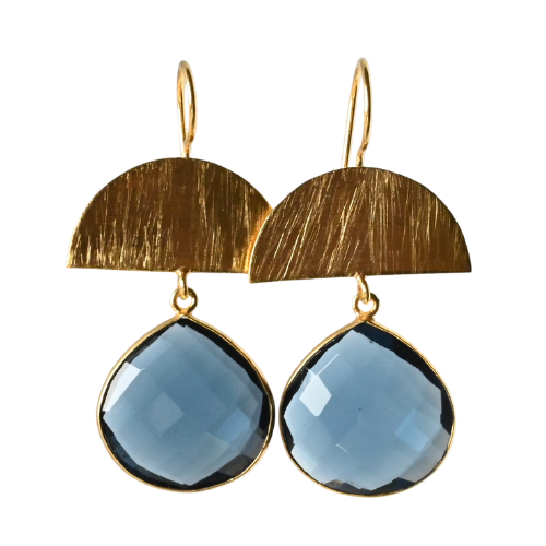 Brushed gold half-moon earrings with large faceted steel-blue London blue quartz drops
