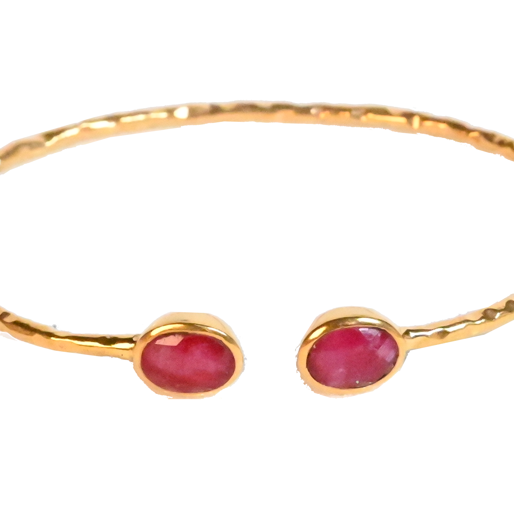 Euro Gold cuff bangle with two ruby-red gems on black background