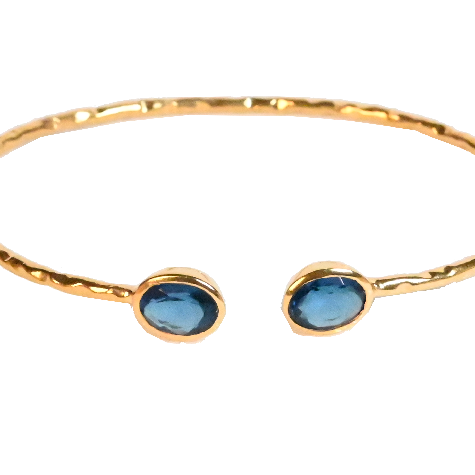 Euro Gold cuff bangle with two London-blue gems on black background