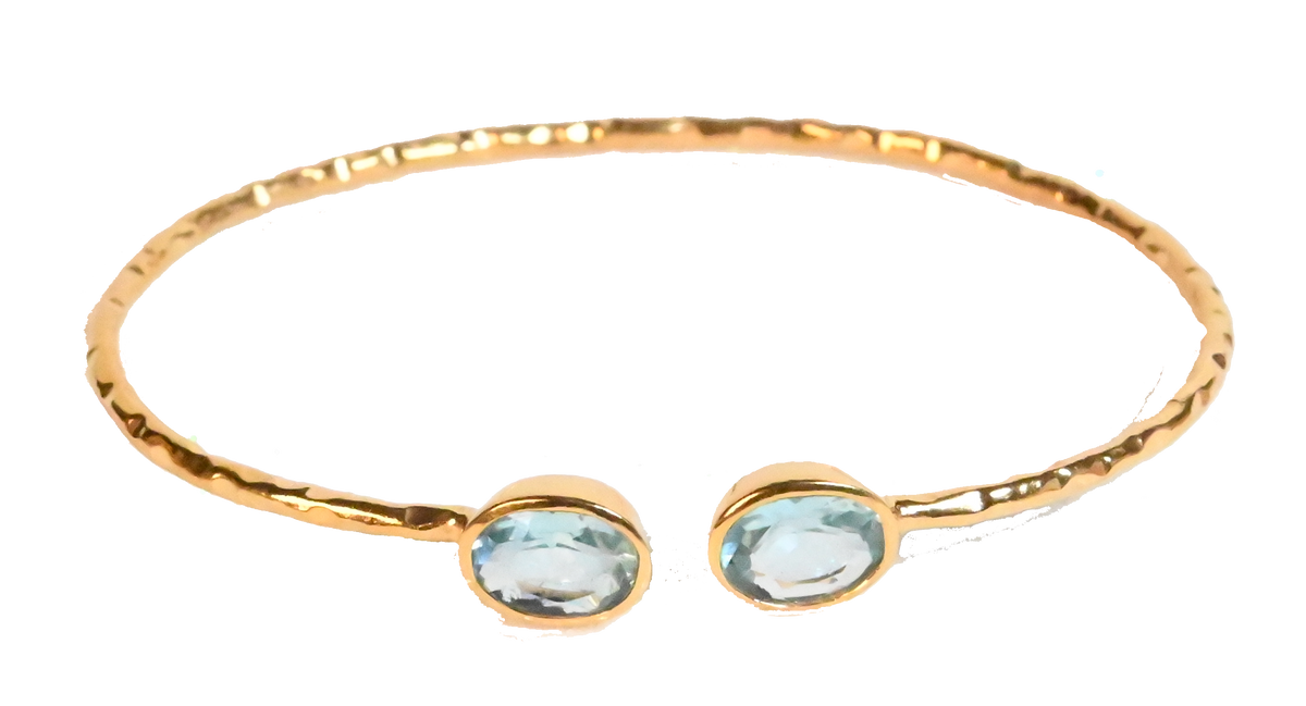 Euro Gold cuff bangle with two aqua-blue gems, hammered finish