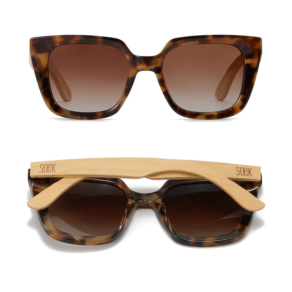 Two pairs of Soluna sunglasses in mocha tortoise, one front-on and one folded, showing the pale maple arms