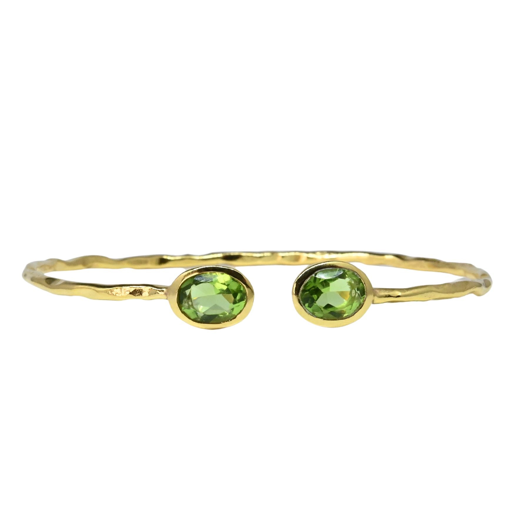 Euro Gold cuff bangle with two peridot-green oval gems
