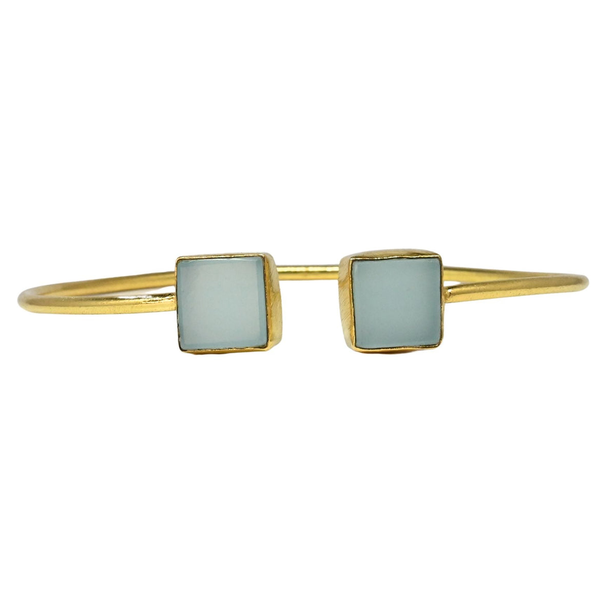 Fine gold cuff bangle with a square pale aqua chalcedony at each end