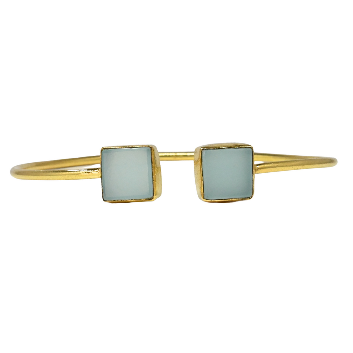 Fine gold cuff bangle with a square pale aqua chalcedony at each end