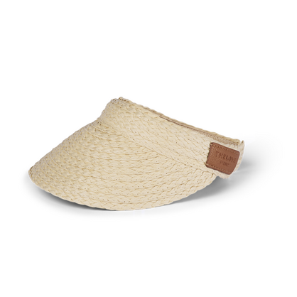 Sporty Visor in Natural: a pale cream woven paper-braid visor with a curved brim and a small tan leather tab at the side, shown side-on.
