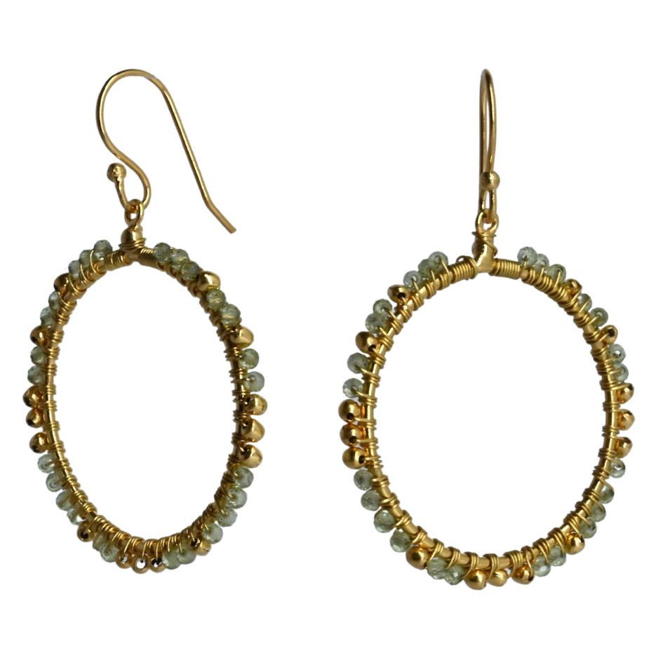 Gold hoop earrings wire-wrapped with pale sage-green peridot beads