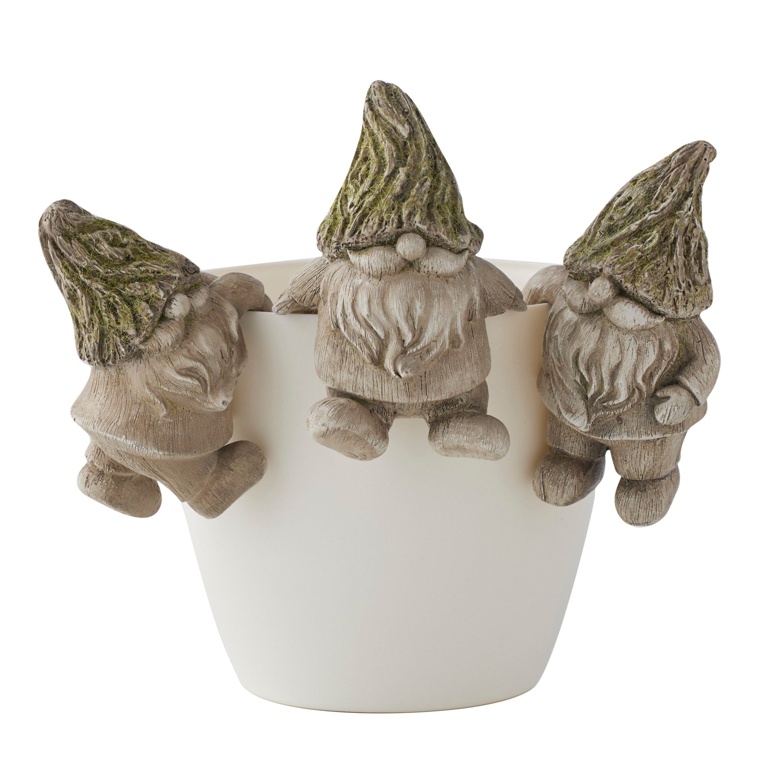 Three small grey gnome figures with mossy green pointed hats, hooked over the rim of a plain white pot.