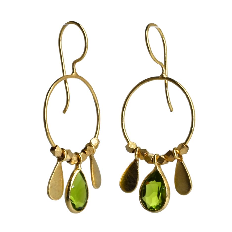 Fine gold hoop earrings with a faceted lime-green peridot teardrop between two gold petals