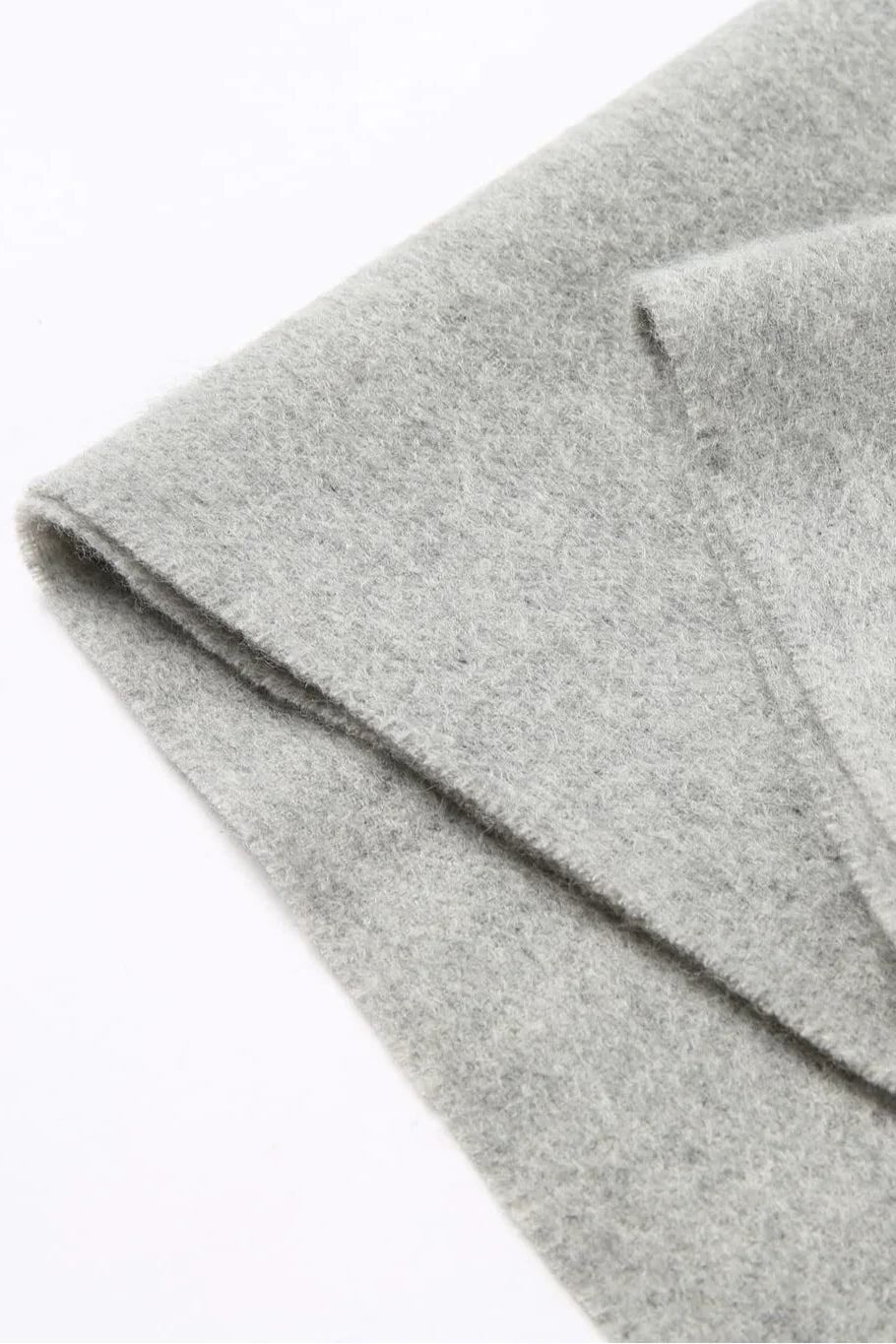 Fold edge detail of the light grey Quartz merino