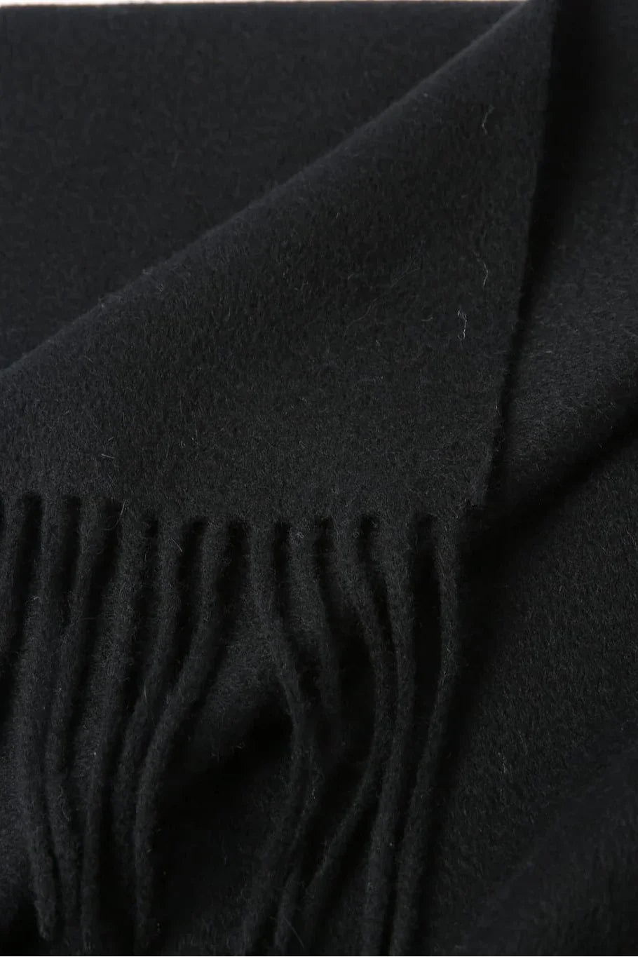 Fringe close-up of the Ebony black merino scarf