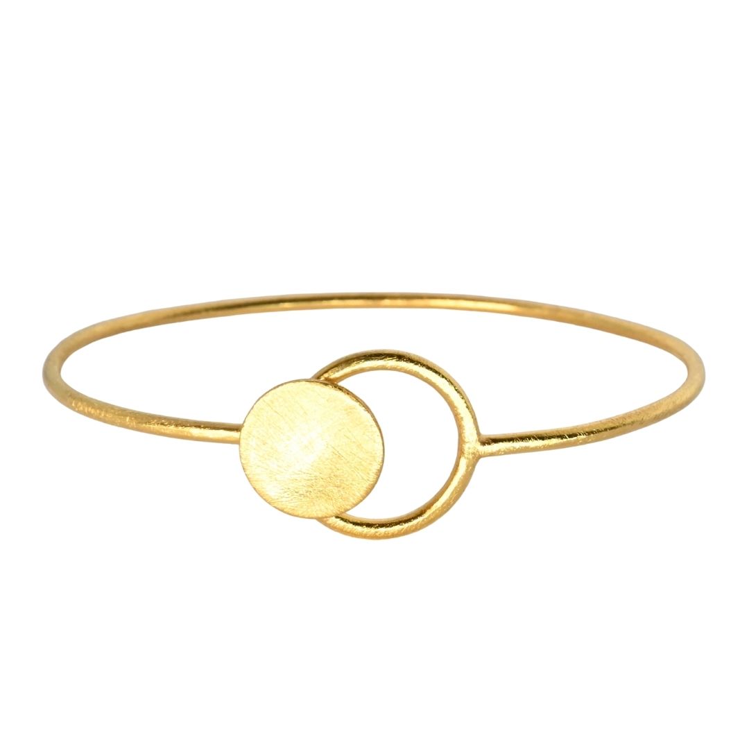 Fine gold wire bangle with a brushed round disc and an open loop at the front
