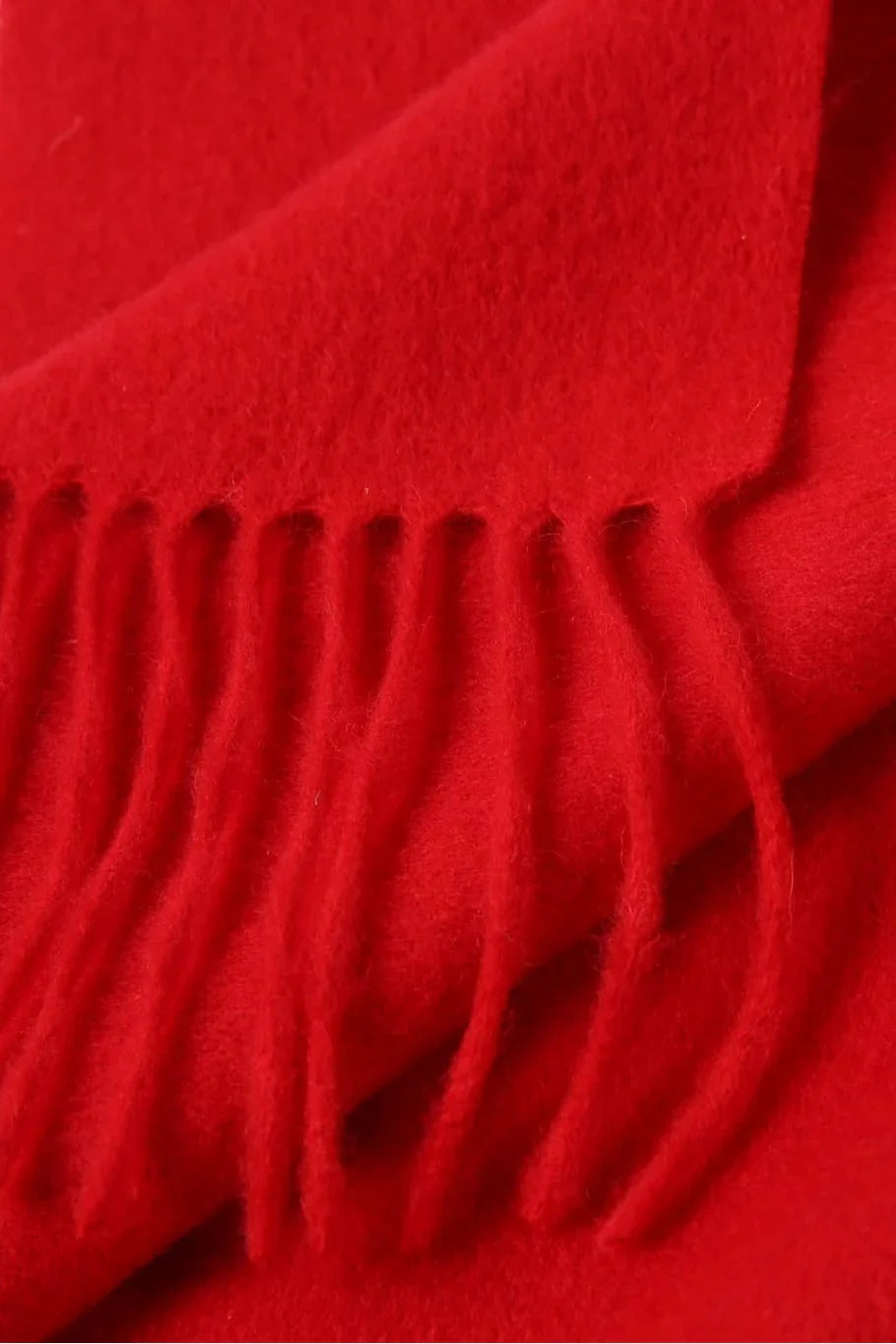 Fringe close-up of the Raving Red merino scarf