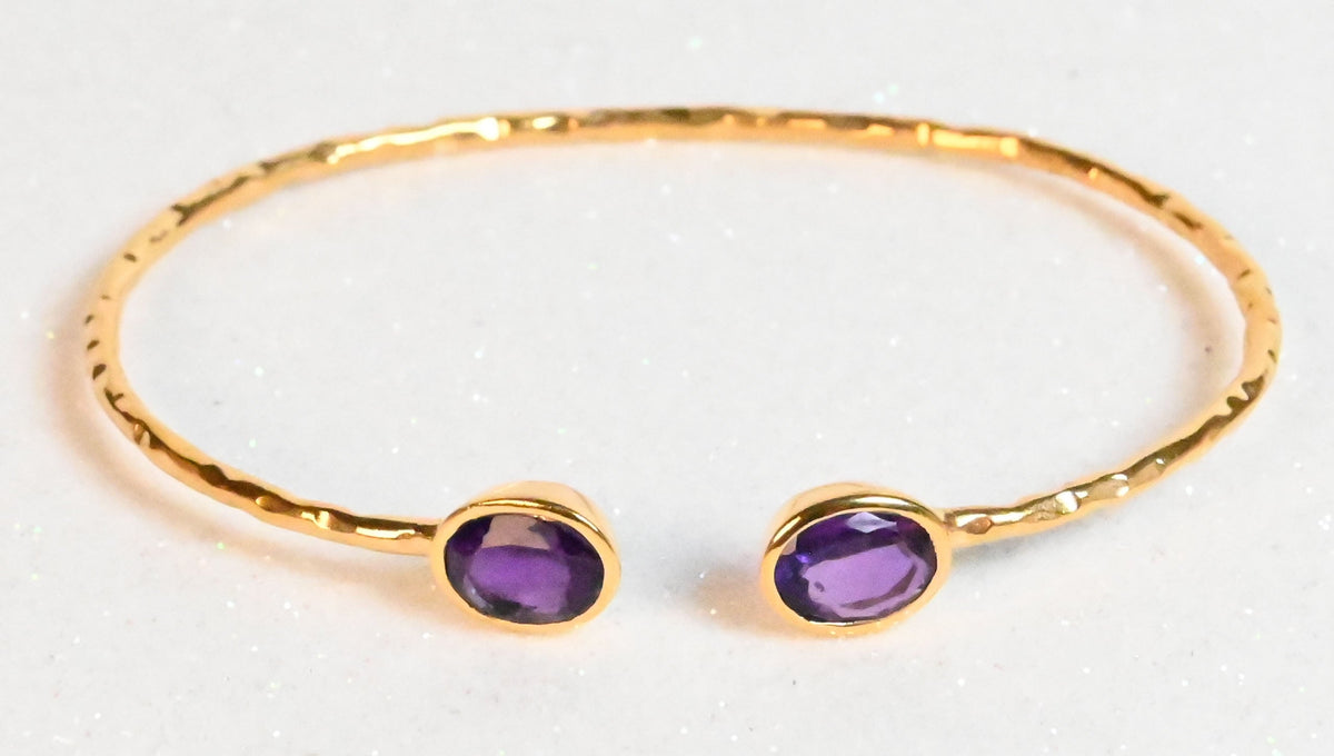 Rose-toned Euro Gold cuff bangle with two amethyst-purple oval gems