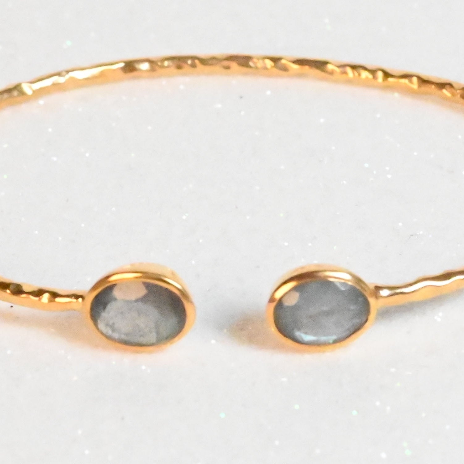 Euro Gold hammered cuff bangle with two grey moonstone-style gems