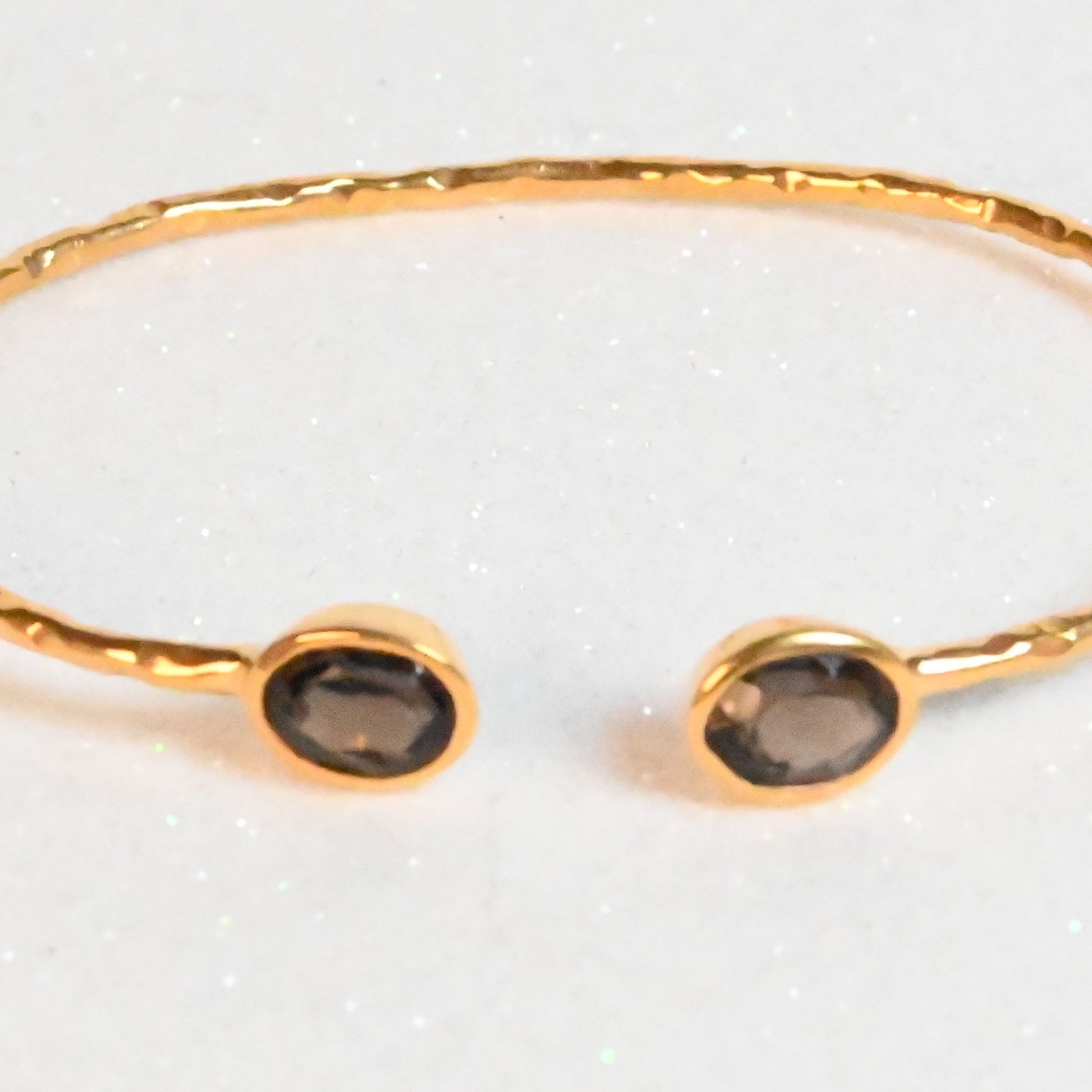 Euro Gold cuff bangle with two smoky quartz oval gems
