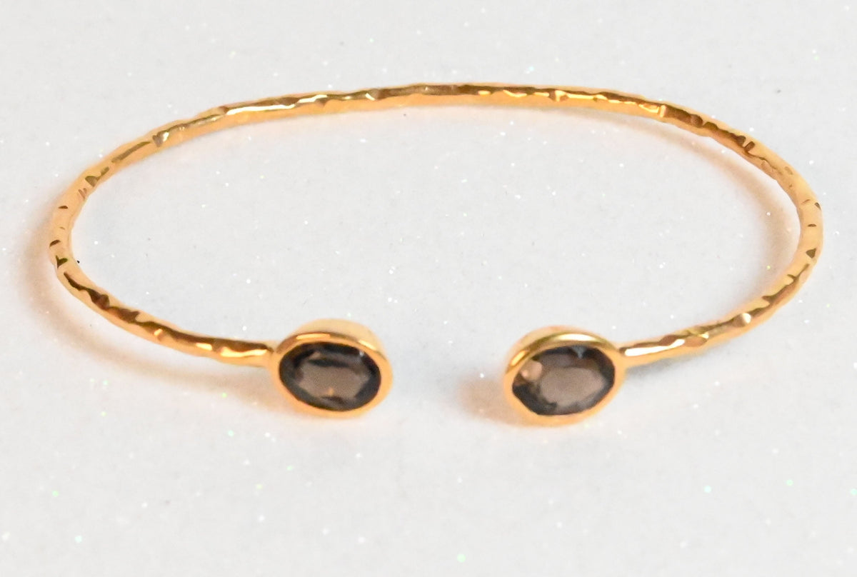 Euro Gold cuff bangle with two smoky quartz oval gems
