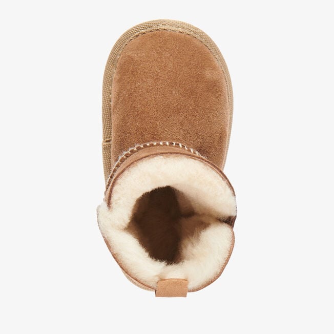 Top-down view of the chestnut baby bootie showing plush wool lining