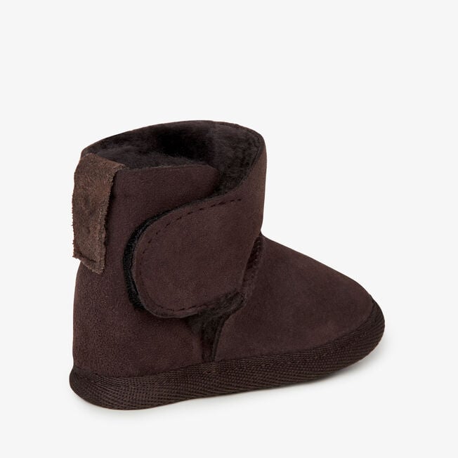 Chocolate baby bootie with the touch-tape strap opened
