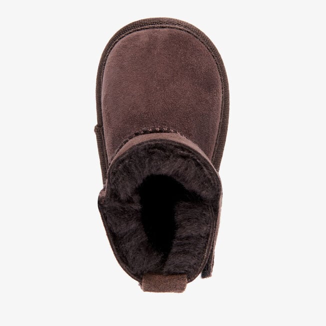 Top-down view of the chocolate baby bootie showing dark wool lining