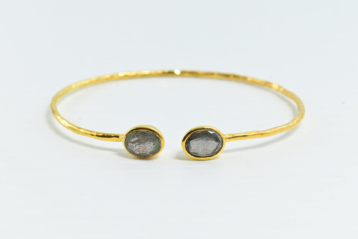 Hammered Euro Gold cuff bangle with two grey labradorite-style oval gems