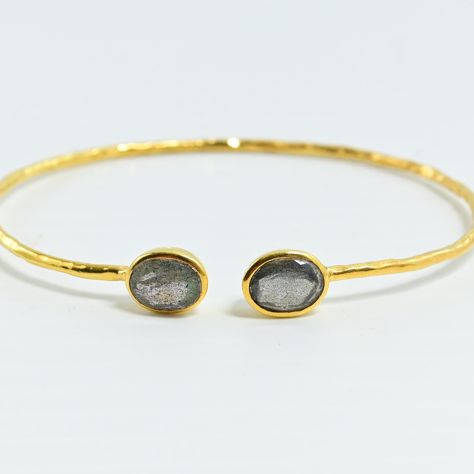 Euro Gold cuff bangle with two oval labradorite-grey gems