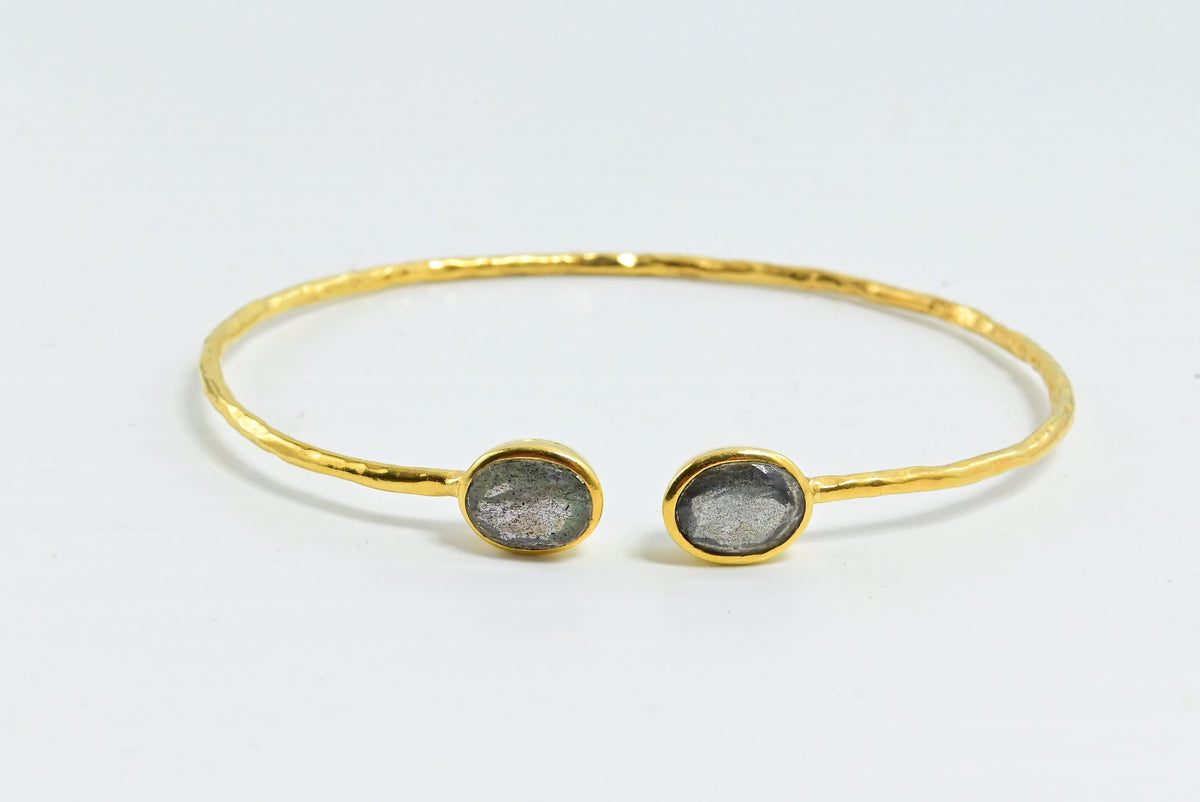 Euro Gold open cuff bangle with two smoky grey oval gems