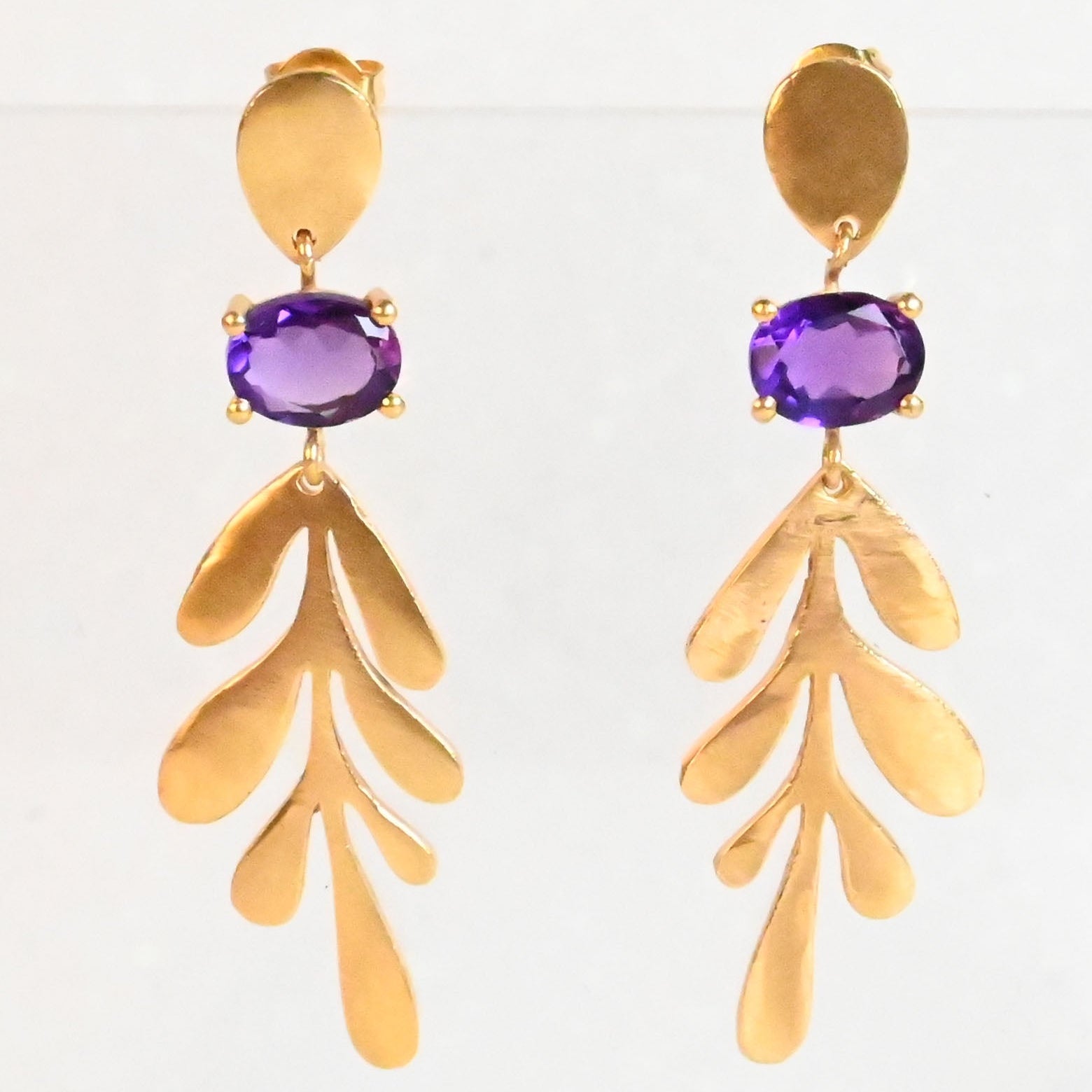 Euro Gold leaf drop earrings with amethyst-purple oval gems