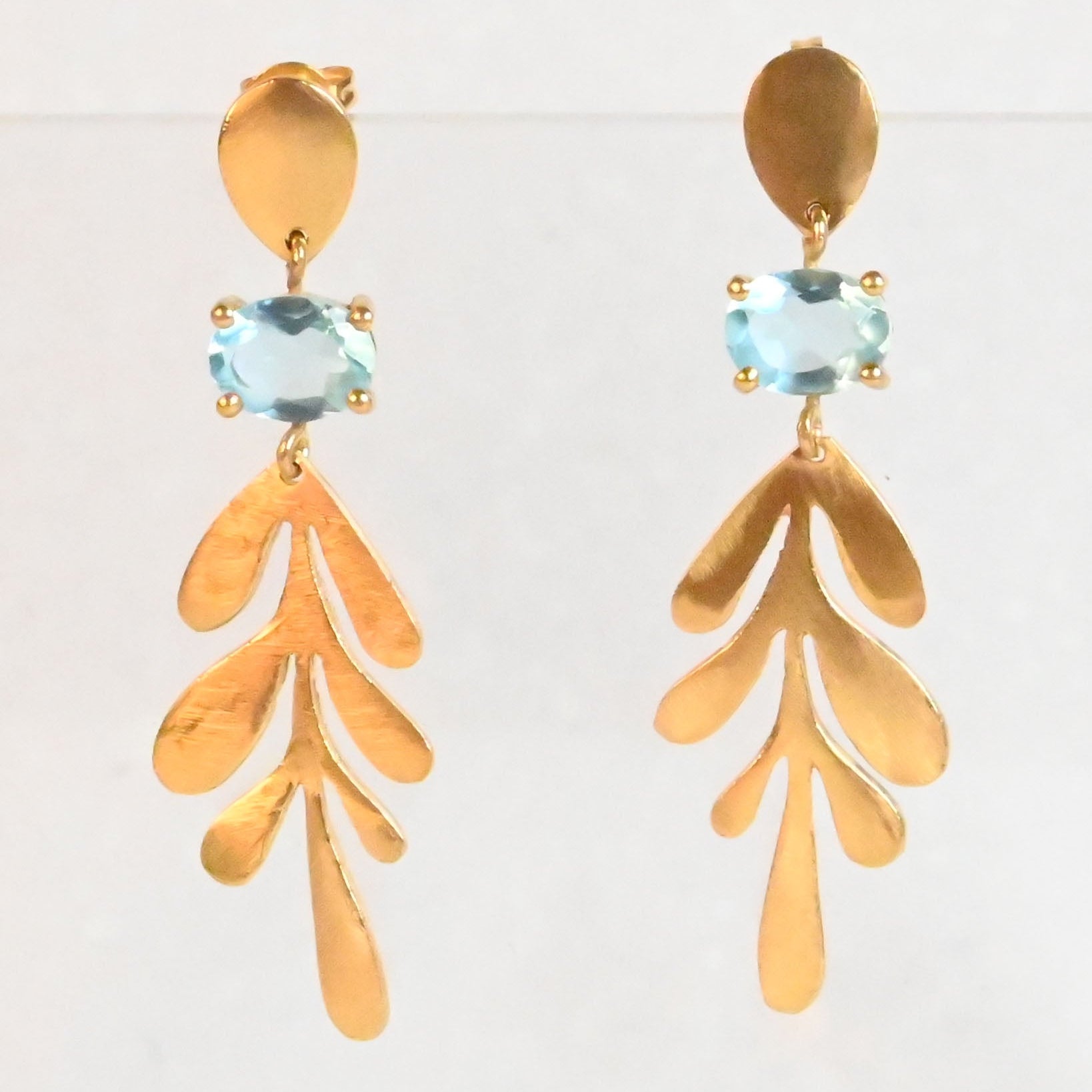 Euro Gold leaf drop earrings with sky-blue topaz oval gems