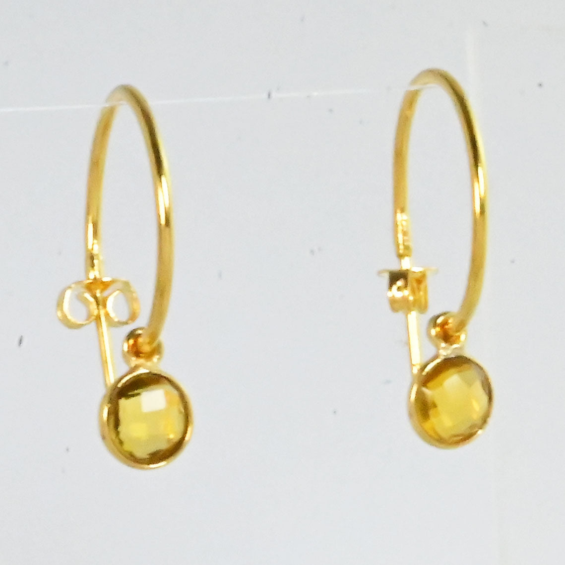 Euro Gold hoop earrings with a faceted golden citrine drop