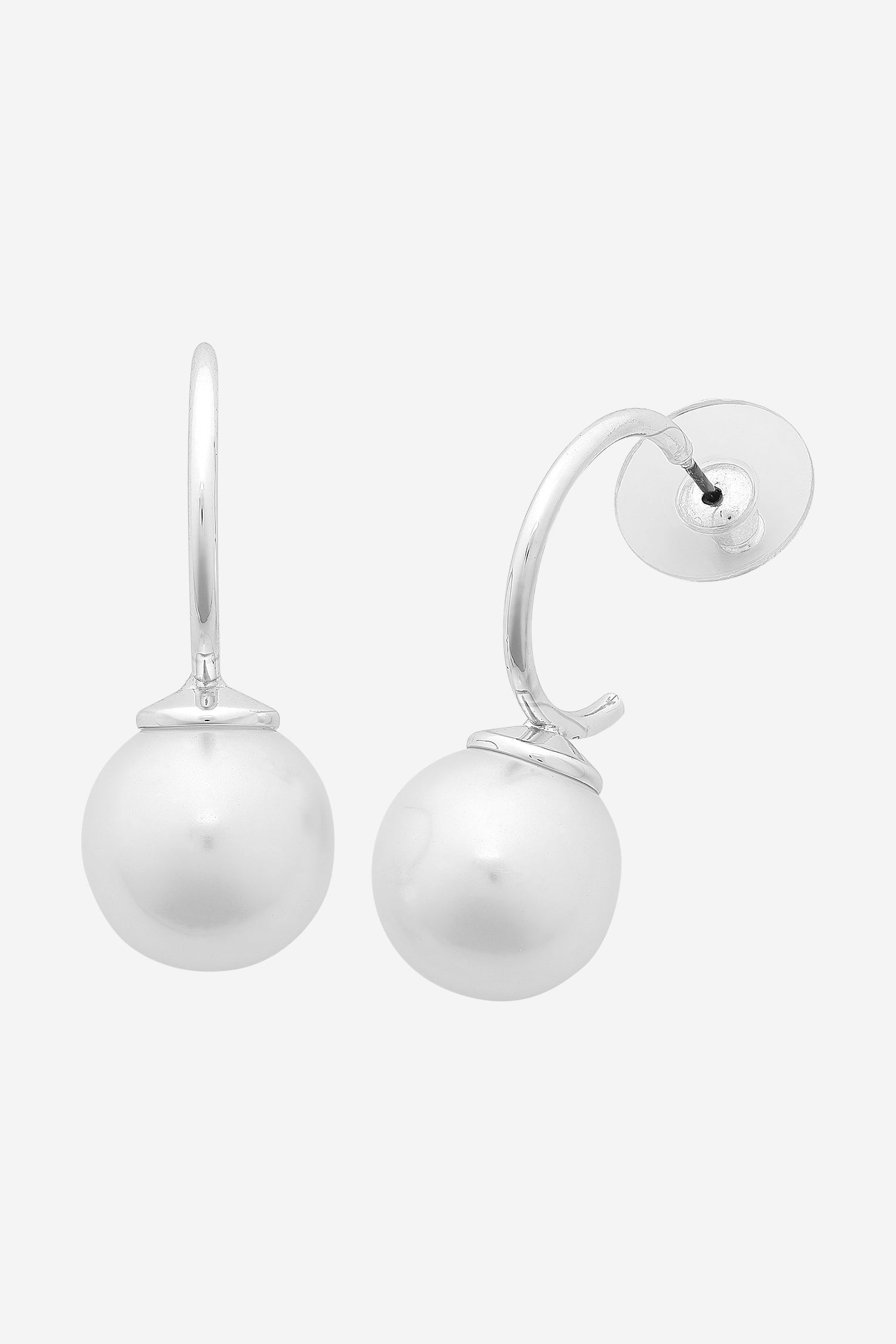 Silver curved hoop earrings, each finished with a large white shell pearl.