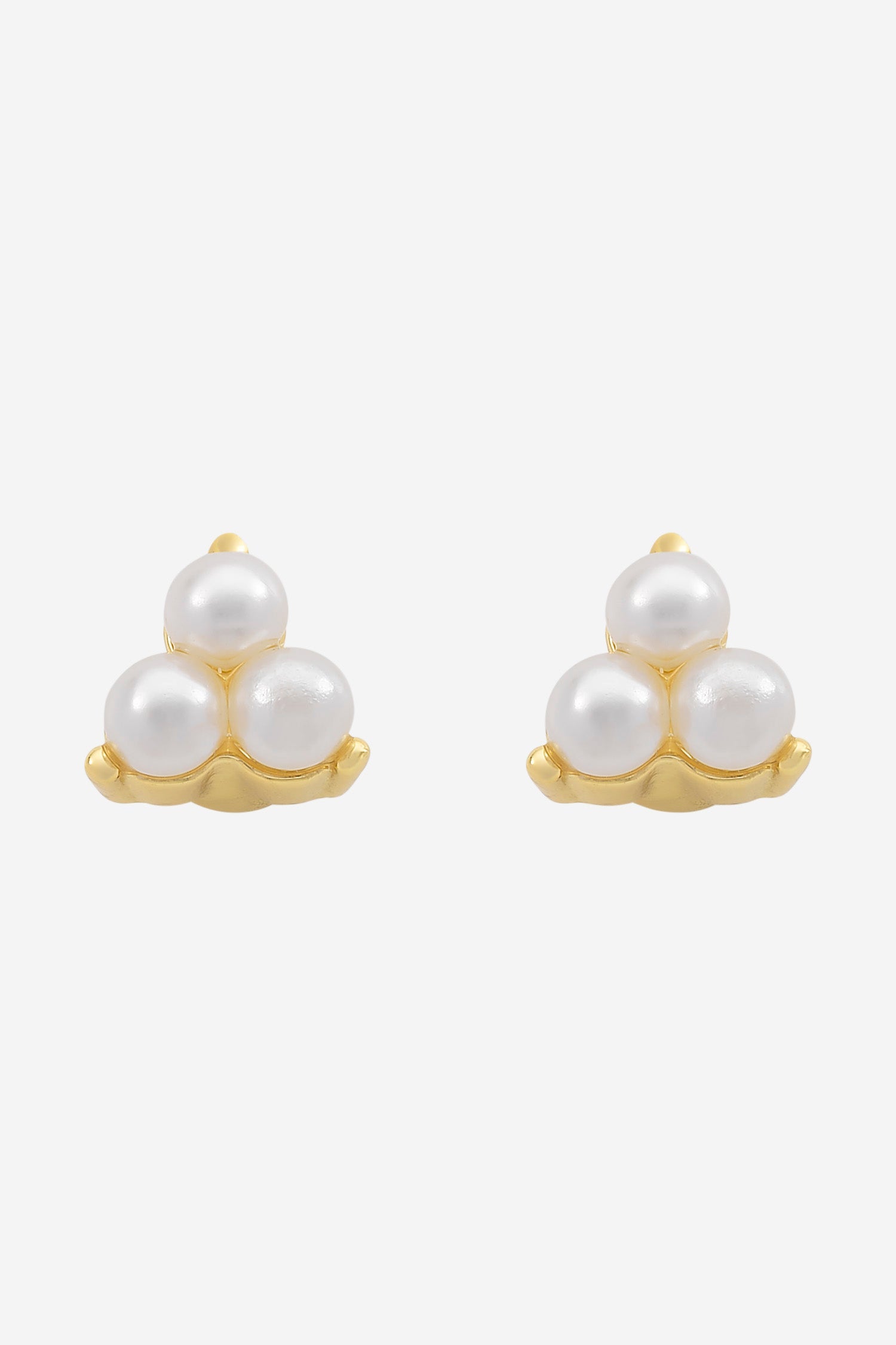Gold stud earrings, each a small trio of white pearls.