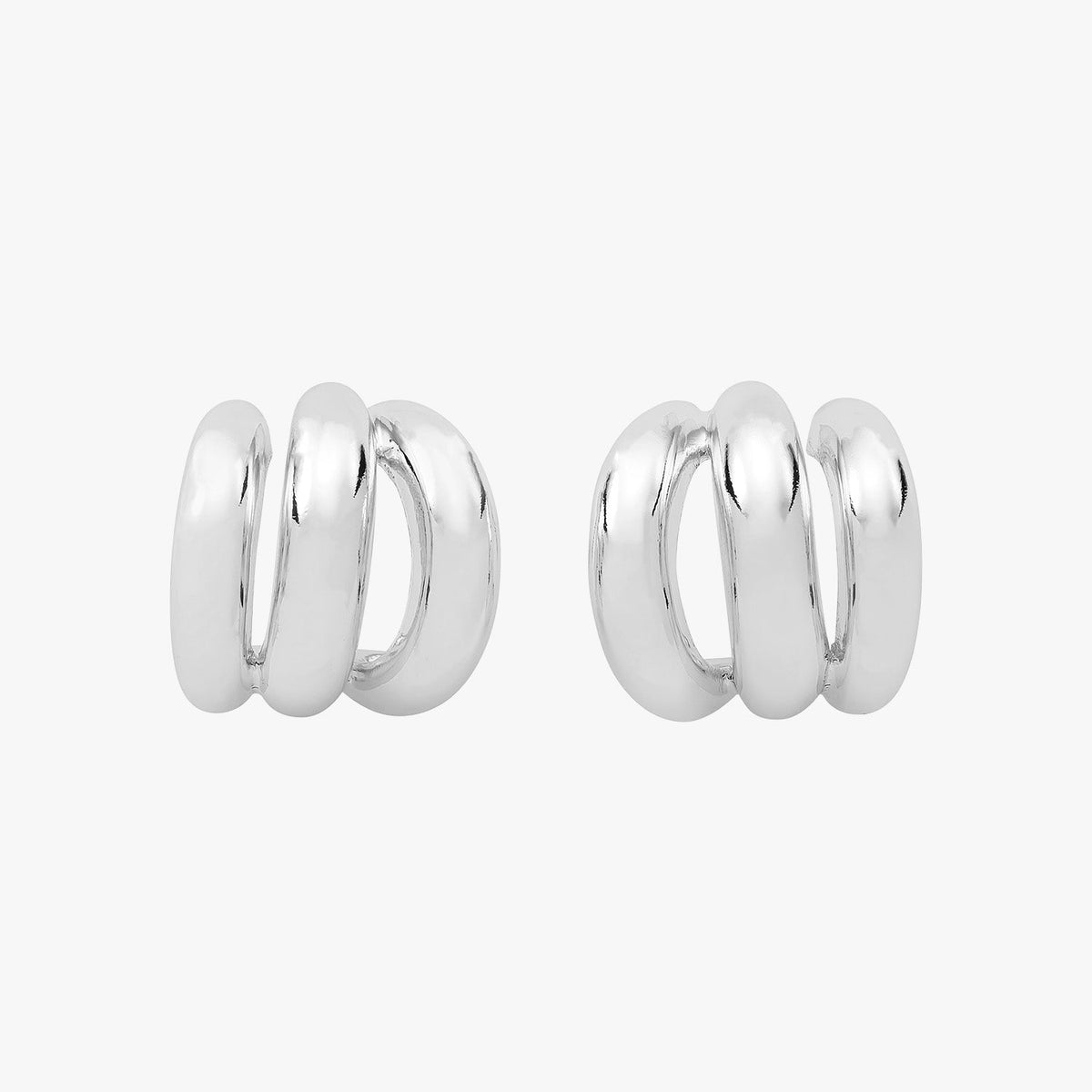Silver triple-hoop earrings that create a layered look from a single post.