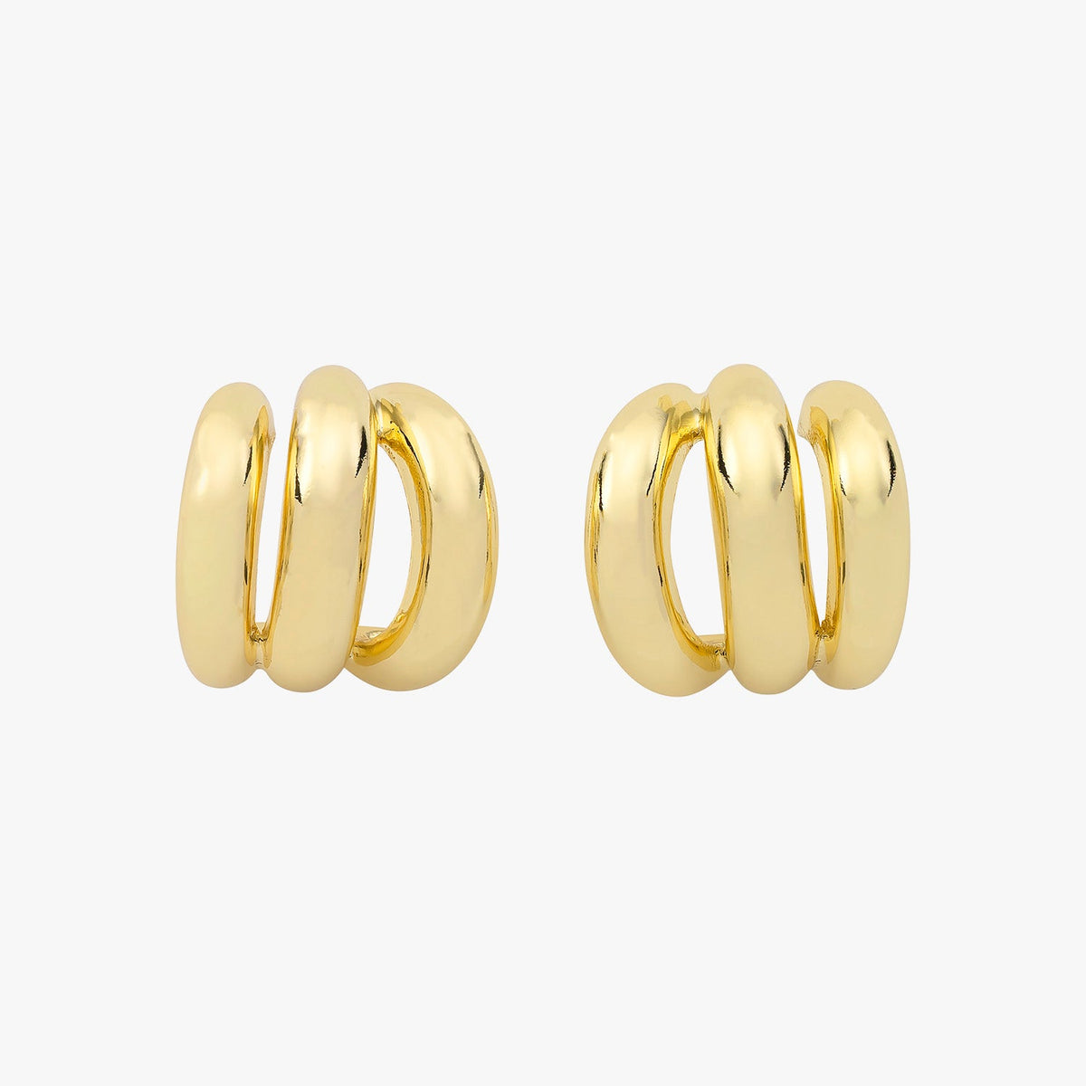 Gold triple-hoop earrings that create a layered look from a single post.
