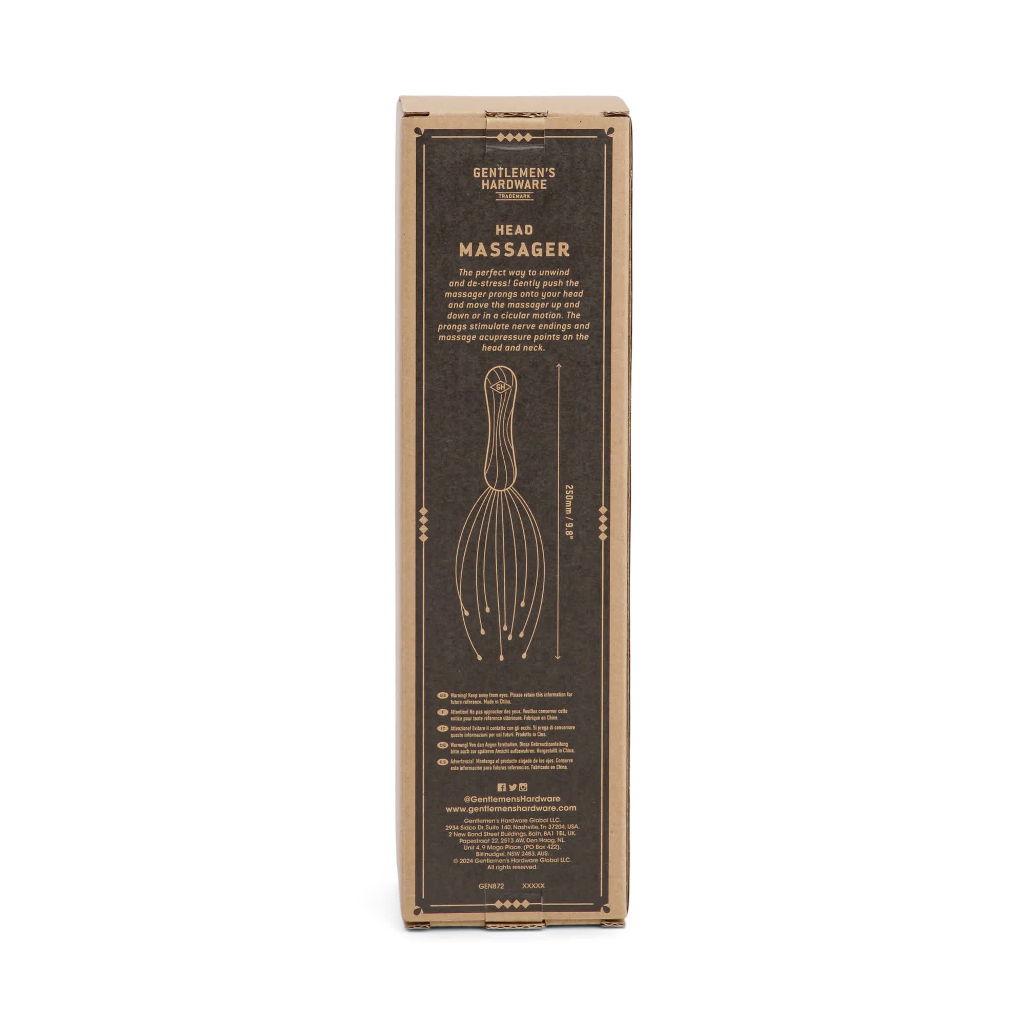 A rectangular brown Head Massager box with gold text and instructions, featuring a front diagram showing how the tool targets acupressure points and nerve endings for relaxation.