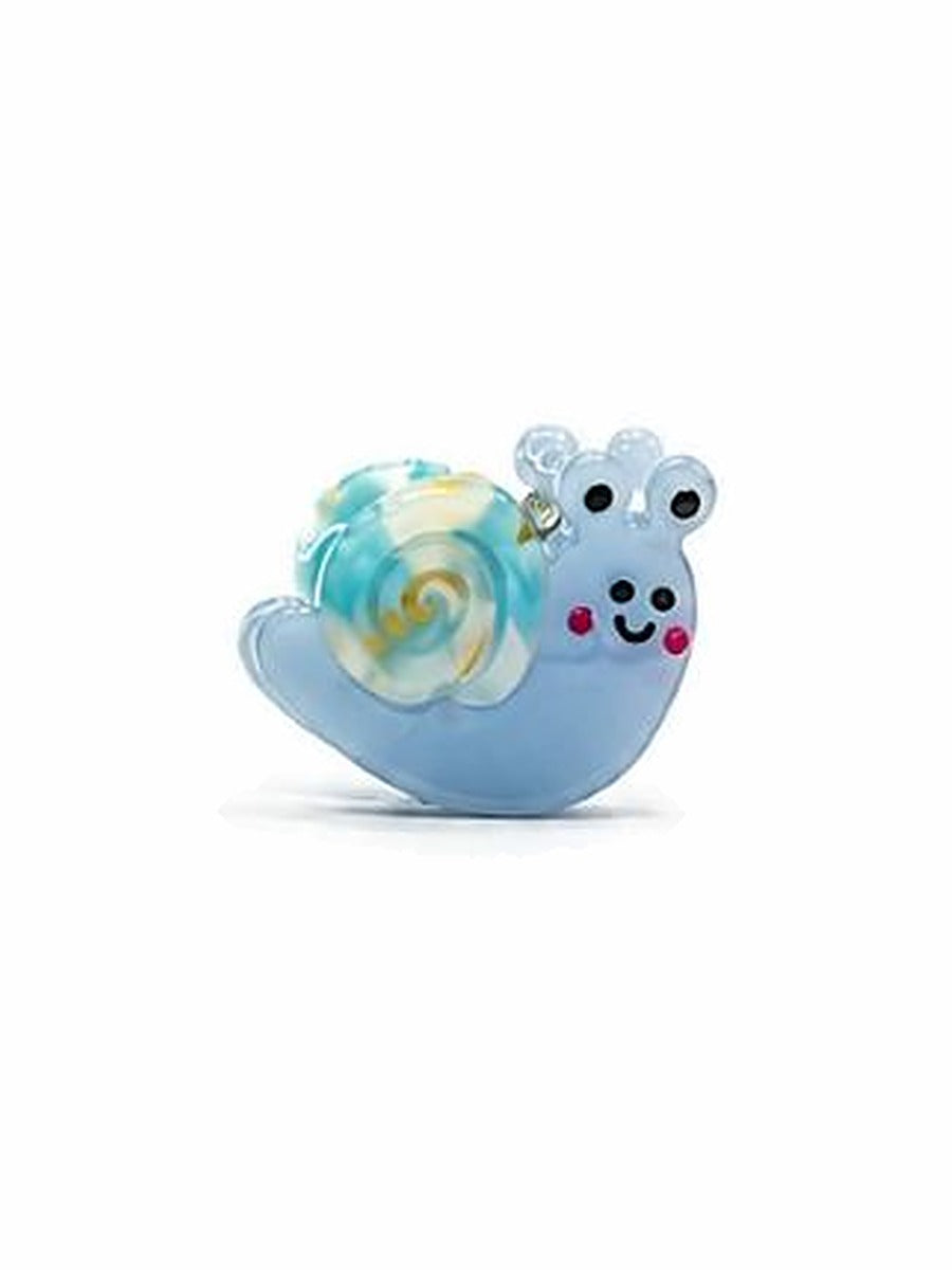 Blue mini snail hair clip with a swirled blue and white shell