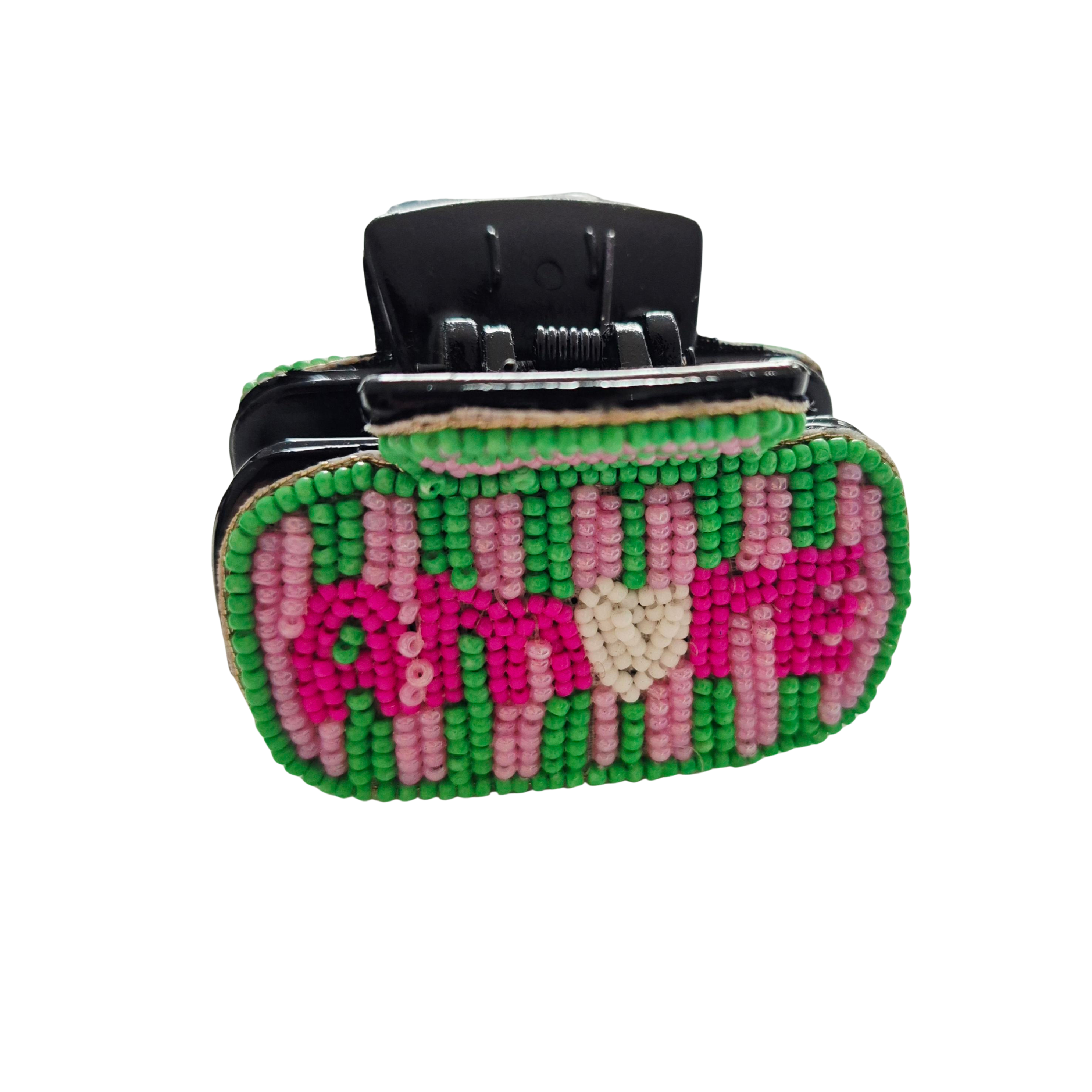 Black claw hair clip covered in green and pink striped beadwork spelling AMORE.