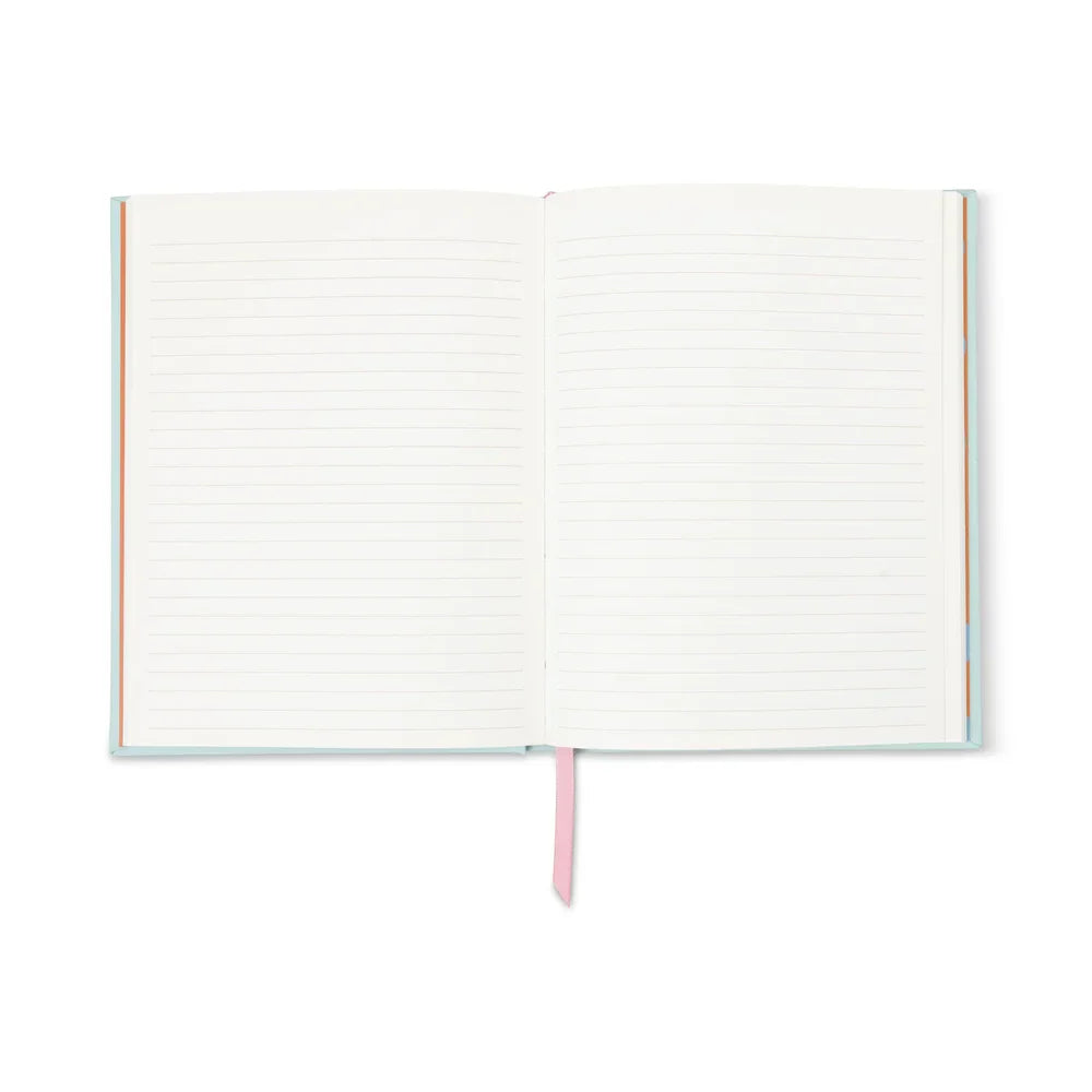 The journal open to its lined ivory pages