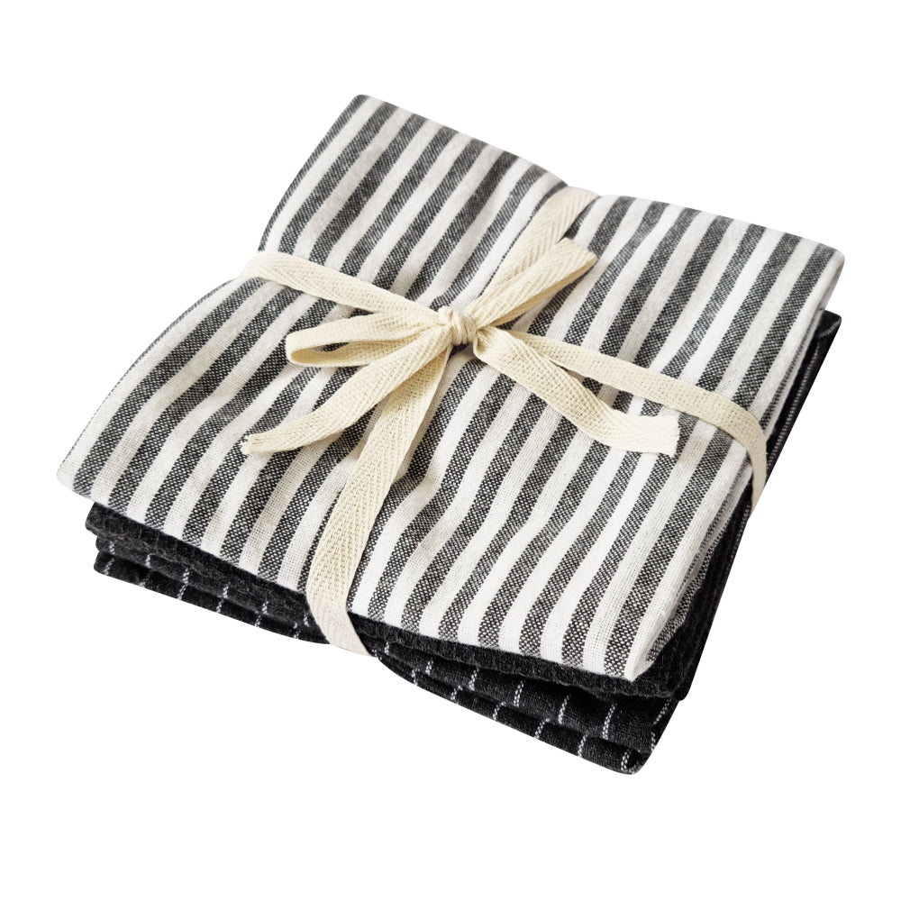 Katerina charcoal tea towel 3 pack folded and tied with a cream ribbon
