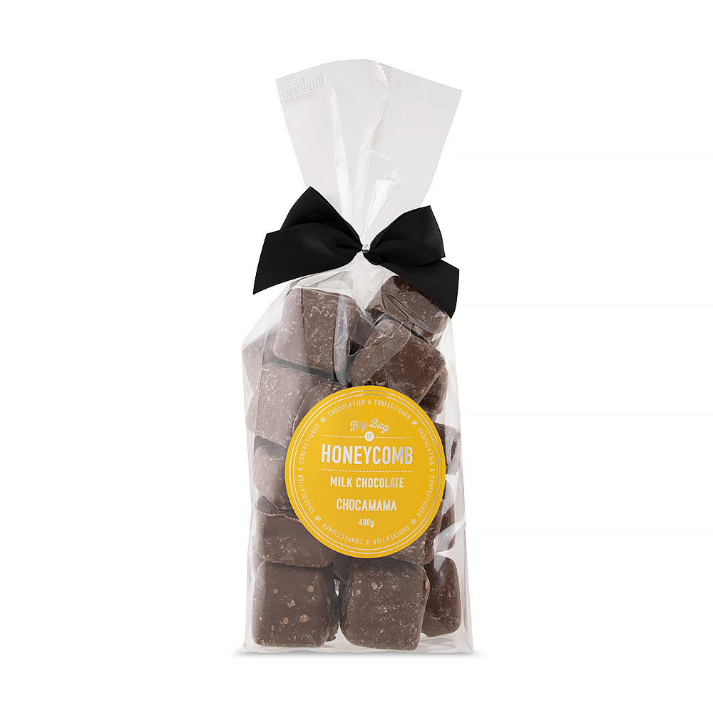 Clear gift bag of chocolate-coated honeycomb pieces tied with a black bow