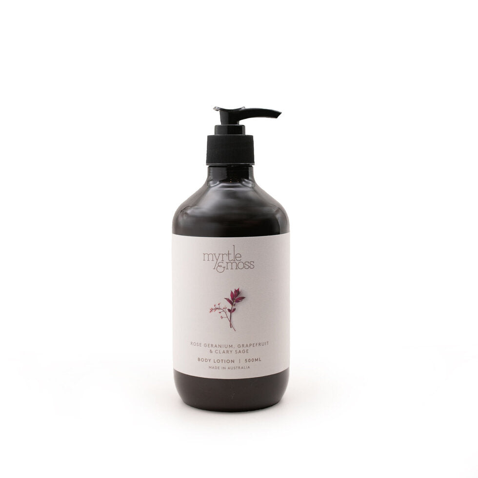 The 500ml Rose Geranium body lotion bottle, its label reading Rose Geranium, Grapefruit & Clary Sage.