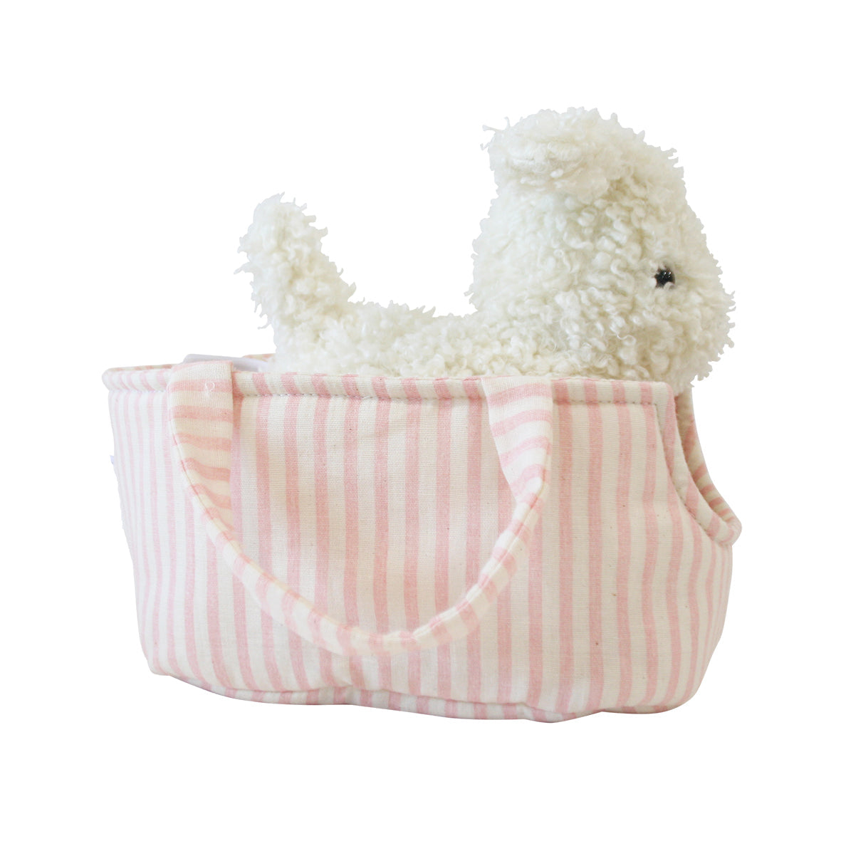 Marshmallow puppy plush peeking over the edge of its pink striped carrier