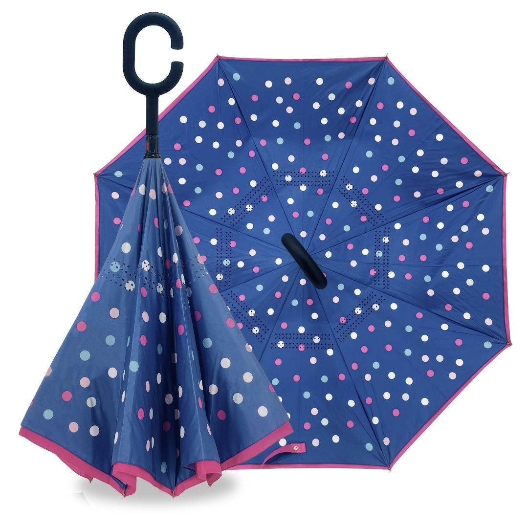 Reverse umbrella in Polka Dots design, navy canopy with white and pink spots and pink trim