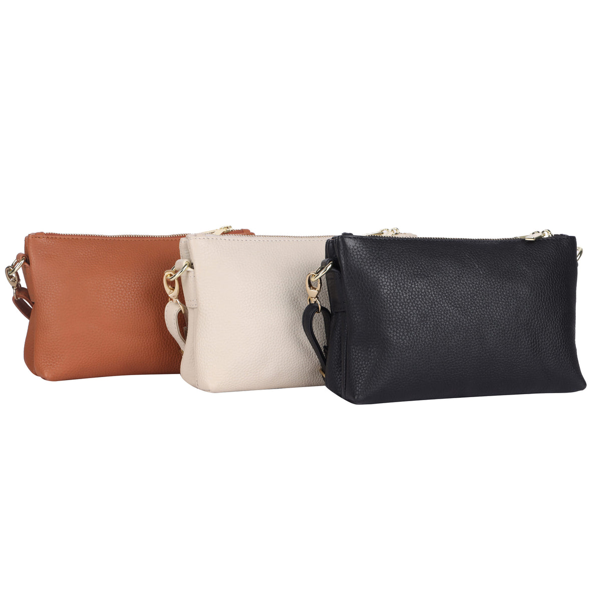 Pebbled leather cross body bags in a row in tan, vanilla and black