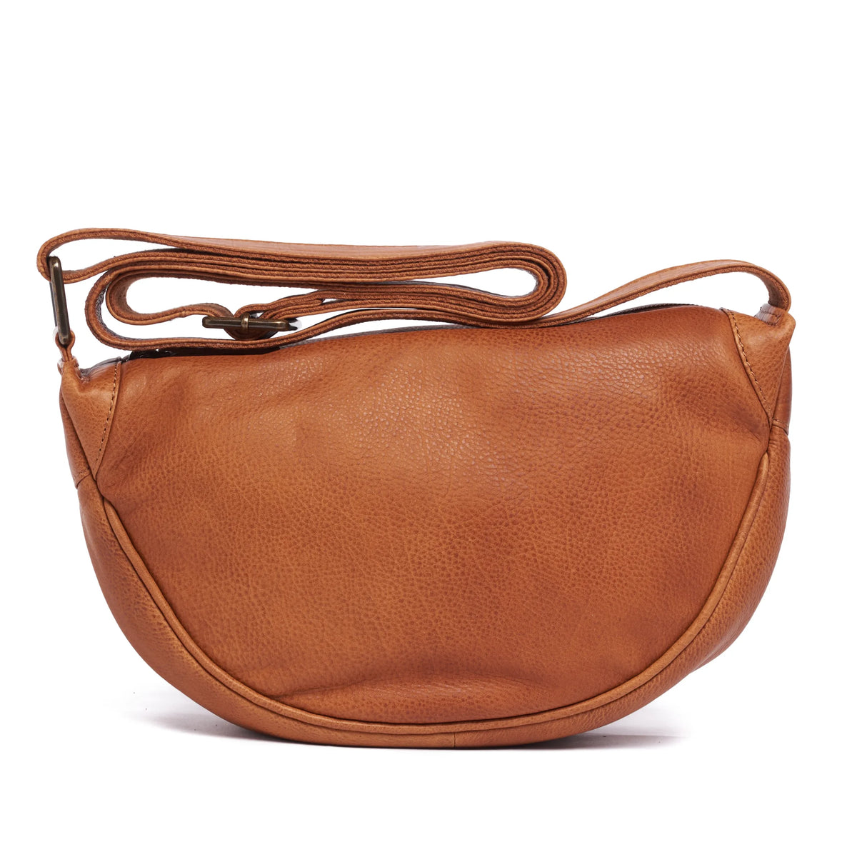 Tan leather half-moon cross body bag, the strap gathered above it
