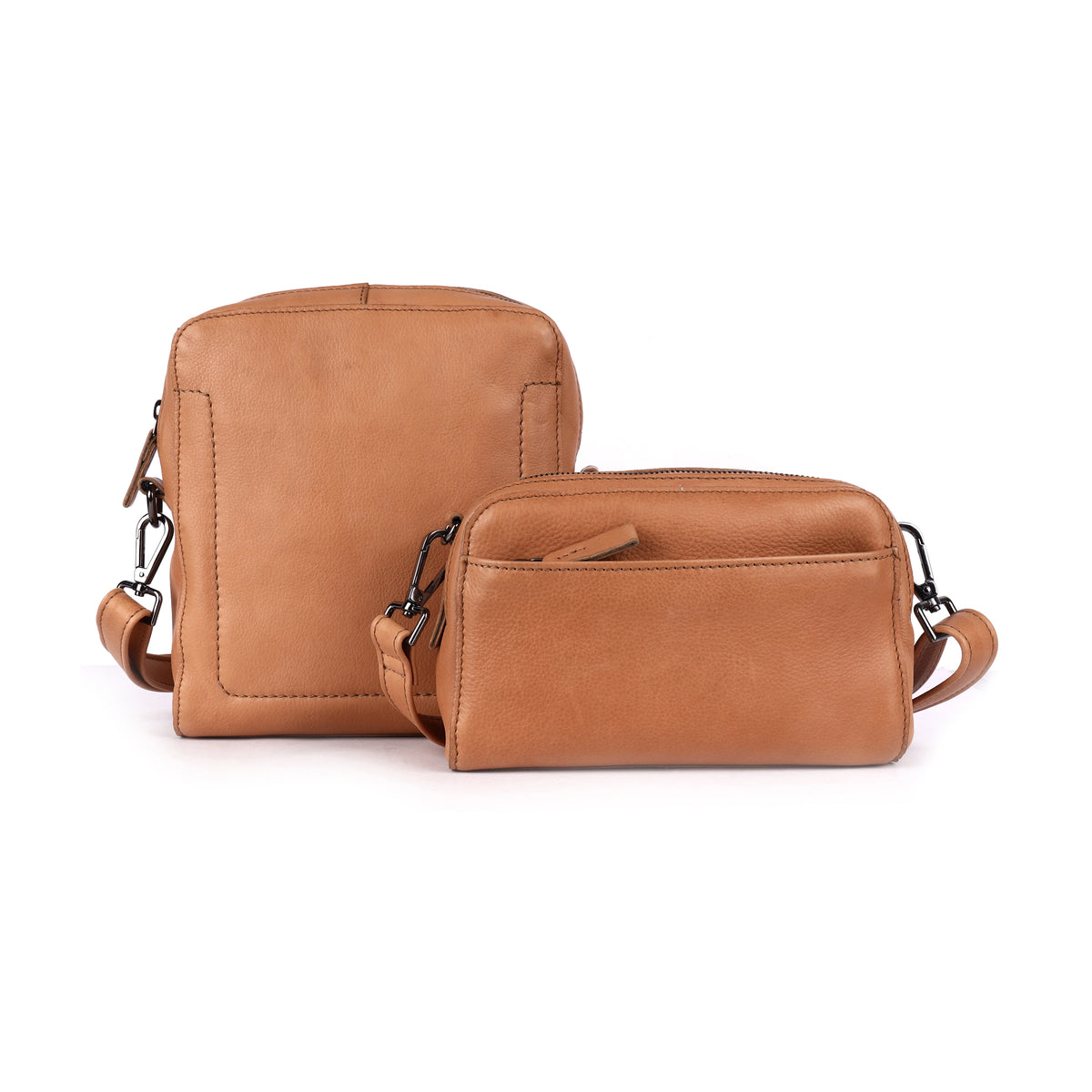Nude sling bag beside a smaller nude zip bag from the same range