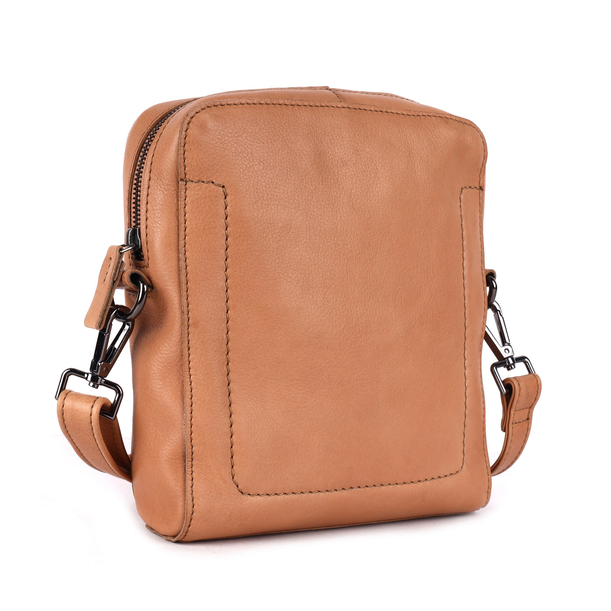 Nude sling bag angled, showing the side seam and strap clip