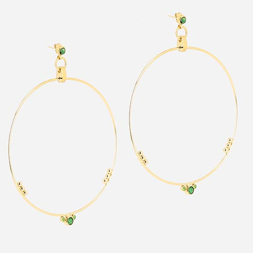 Pair of large fine gold hoop earrings set with small green stones along one side