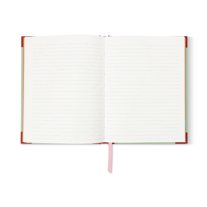 The journal open to its lined ivory pages